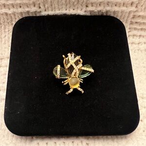 Joan Rivers Gold-Tone Bee Brooch with Green Wings and Clear Stones